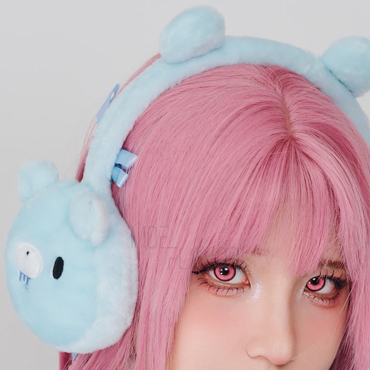 Blue fluffy earmuffs by MOEFLAVOR featuring plush bear ears on top and embroidered Gloomy Bear faces on the sides.