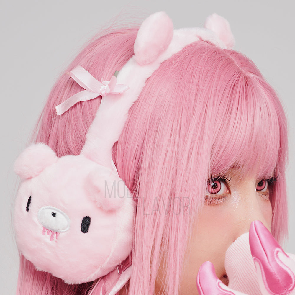 Pink fluffy earmuffs by MOEFLAVOR featuring plush bear ears on top and embroidered Gloomy Bear faces on the sides.