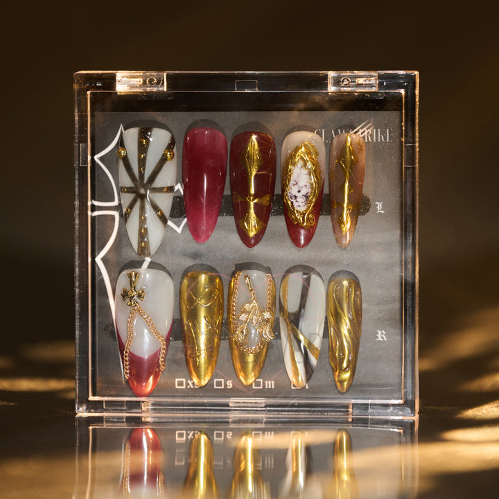 Gold Drip Nun Press On Nails by MOEFLAVOR, featuring bold, edgy nails inspired by the nun-style collection, adding a heavenly touch to your look.