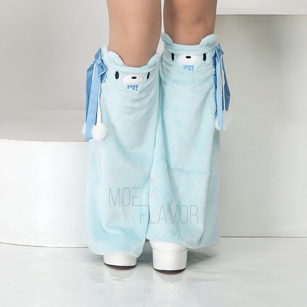 Blue pastel winter leg warmers featuring a plush feel, Gloomy Bear's embroidered face with ears, an elastic back, and a lace-up ribbon side topped with a big bow.