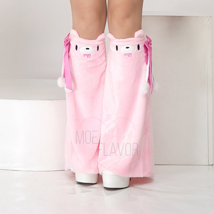 Pink pastel winter leg warmers featuring a plush feel, Gloomy Bear's embroidered face with ears, an elastic back, and a lace-up ribbon side topped with a big bow.