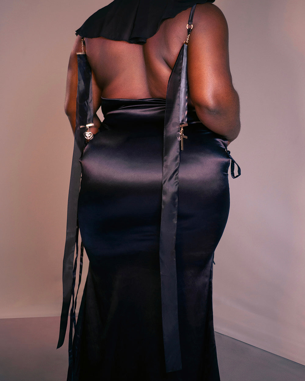 Gold Drip Nun Chain Dress by MOEFLAVOR, a sleek satin design with a draped back and delicate hanging cross pendants for an elegant yet edgy look