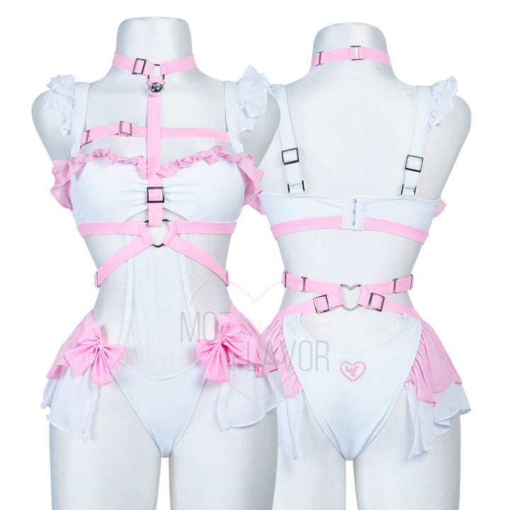 Ironmouse Magical Girl Swimsuit by MOEFLAVOR, a pink and white one-piece with ruffles, removable padded top, pink straps with bows, and a dainty bell collar, blending style and fantasy. Officially licensed collaboration with VSHOJO.